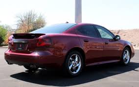 Image result for Medium Red Mica 2004 Pontiac