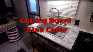 adding a cutting board sink cover in