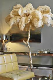 An illuminating palm tree, resplendent with exquisite ostrich feather foliage, the feather floor lamp takes centre stage in any luxury setting and delivers the ultimate midas touch to hollywood regency decors. The Ostrich Feather Lamp Feather Lamp Lamp Inspiration Modern Lamp