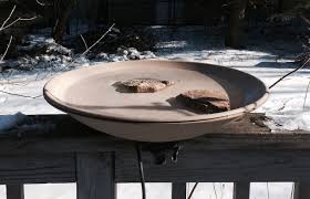 This diy bird bath is simply an old plate and a bowl, a glass gem stones and some gorilla glue! How And Why To Provide Fresh Water For Birds In Winter