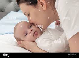 Coccole per bambini immagini e fotografie stock ad alta risoluzione