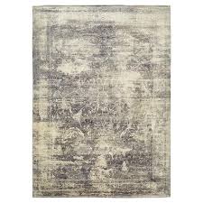 Nothing feels quite like silk under the feet. Samoke Distressed Taupe Cream Silk Rug