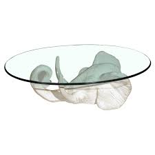 Luxurious and elegant, this coffee is the perfect piece to add the exotic safari theme to home or office. White Plaster Elephant Coffee Table Elephant Elephant Rock Asian Home Decor