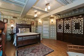 Absolutely Stunning Below Grade Bedroom With Hardwood Floors Wood Paneling Beadboard And Box Beamed Ceiling And Ceiling Beams Hardwood Floors Wood Paneling