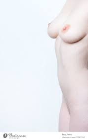 Naked woman with beautiful breasts - a Royalty Free Stock Photo from  Photocase