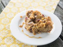 A recipe that feels simple but indulgent all at the same time. Orange And Cranberry Bread Pudding With Warm Salted Caramel Recipe Hgtv