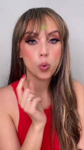 Person Styling Long Wavy Hair with Hand Gestures