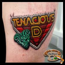 Tenacious D and The Pick of Destiny. "This is not the greatest tattoo in  the world. It's just a tribute" 😆 🤣 😂. Tenacious D is an American comedy  rock duo formed