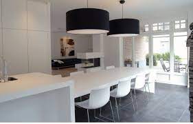 moderne keuken met kookeiland en geintegreerde eettafel maatwerk door gf concepts open keuken met h moderne witte keukens moderne keukens design woonkamers