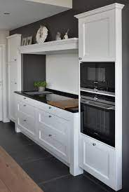 zwart witte landelijke keuken met inductie kookplaat keuken idee keuken interieur keuken ontwerpen