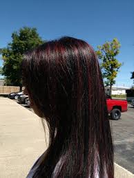 Long gone are the days where silver and gray strands were something to stress over. Pin By Amanda Brown On Hair Black Hair With Highlights Hair Styles Black Red Hair
