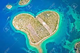 Galešnjak (also called island of love, lover's island, otok za zaljubljene, love island) is located in the pašman canal of the adriatic, between the islands of pašman and the town of turanj on mainland croatia. Heart Shaped Island Of Galesnjak In Zadar Archipelago Aerial Stock Photo Picture And Royalty Free Image Image 129311403