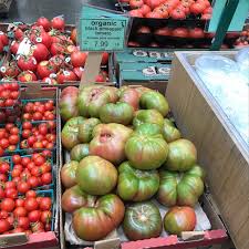 Cherries and small fruit tomato plants. Pineapple Heirloom Tomatoes Information And Facts