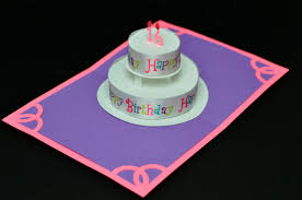It opens up, folds flat, and reveals a fantastic slice of black forest gateau. Round Birthday Cake Pop Up Card With Happy Birthday Ribbon Creative Pop Up Cards