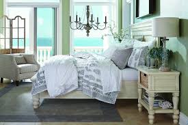 Ashley S Exclusive Marsilona Bedroom Light Washed Woods Give Off That Relaxed Vintage Feel Queen Panel Beds Master Bedrooms Decor Panel Bed