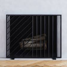 They keep sparks out of your living space, so you can enjoy the warm glow without the threat of embers dancing across the. Parallel Lines Metal Fireplace Screen Black