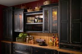 rustic kitchen with black cabinets