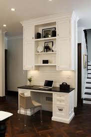 Fabulous Kitchen With Built In Desk Featuring White Cabinets Accented With Polished Nickel Hardw Home Office Cabinets Kitchen Remodel Trends Home Office Design