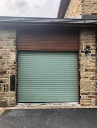 Our chartwell green upvc french doors can be installed without the 40mm ventilator and 30mm cill to decrease the overall height if required. Sws Seceuroglide Roller Door In Chartwell Green With Golden Oak Liners West Yorkshire Garage Doors