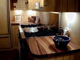 Each cabinet is supplied with a single solid oak shelf (additional solid wood shelves can be purchased separately if required). Zebra Wood Wide Plank Countertop