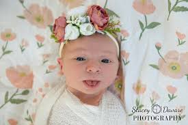 Newborn sessions aren't just for the new baby, especially when the big  sister is an absolute ham and loves the camera! Baby sister needed lots of  snacks and cuddles during her session,
