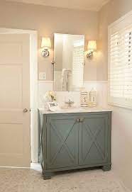 A dark bathroom balanced with white is a great way to go. Pin On Bathroom Cabinetry