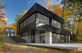 This includes pantry doors which can be revolving doors for children! Dark Exterior Light Interior 6 Homes That Celebrate Contrast