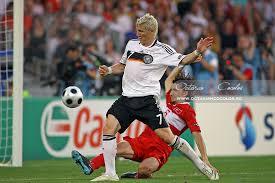 He doesn't prefer dribbling even he's capable of doing it. Germany Vs Turkey Uefa Euro 2008 Bucharest Romania Photographer Octavian Cocolos