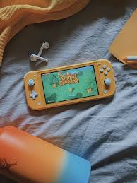 Nintendo Switch Lite And Animal Crossing New Horizons In 2020 Nintendo Switch Animal Crossing Nintendo Switch Accessories Nintendo Lite