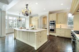 Image Result For Antique Cream Cabinets White Walls Antique White Kitchen Antique White Kitchen Cabinets Traditional Kitchen Cabinets