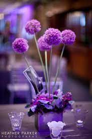 Pin By Heather Parker On My Photography Flower Centerpieces Purple Wedding Centerpieces Wedding Centerpieces