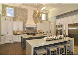 Browse a wide variety of kitchen island designs, including prep table and kitchen cart ideas in stainless steel, butcher block, granite and more. Naples Homes For Sale Home Decor Kitchen Custom Kitchens Staged Kitchens