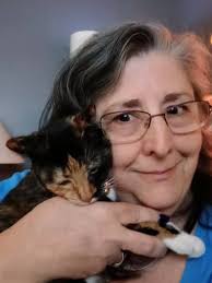 I am so happy to post these pictures and the heart warming story that goes  with them. Caitlin was a tiny kitten who came to hsforbc with horrible eye  infections. She was