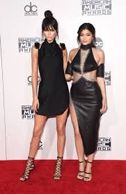 Then i got an obsession with makeup because i would overline my lips and it. Kendall And Kylie Jenner S Dresses At The 2015 Amas Popsugar Fashion