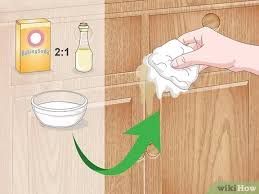 Too much rubbing will create lightened areas. How To Clean Oak Cabinets With Pictures Wikihow