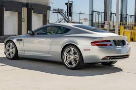 Image result for Lightning Silver 2008 Aston Martin