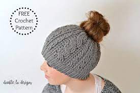 This easy crochet hat pattern + tutorial contains affiliate links. Free Crochet Pattern Crochet Cabled Messy Bun Hat Adult Sizes Video Tutorial Included A Crocheted Simplicity