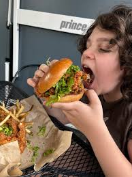 After the Mardi Gras parade we ordered pizza from pie.zaa. Picture for  size,we had a king size bed! It was pretty good not our favorite the price  was over $70.00. I'm sure