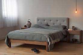 This contemporary padded bed frame comes with soft upholstered linen that goes well with a range. Arran Buttoned Headboard Bed Natural Bed Company