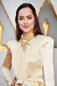 The gown is by gucci, paired with some cartier jewels from a museum, as johnson put it to ryan seacrest on the red carpet. Dakota Johnson S Hair And Makeup At The 2017 Oscars Popsugar Beauty