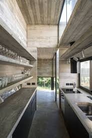 A Holiday Home House S J By Luciano Kruk Arquitectos The Strength Of Architecture From 1998 Concrete Interiors Modern House Design Modern House