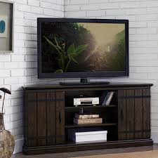 A lot of tvs are going to be roughly 7 to 10 inches less than the screen size. Hunt Club Rustic Oak Wood 55 Inch Corner Tv Stand Overstock 20225227