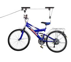 Weight lifting strength training dumbbell storage. This Pulley System Will Keep Bikes From Being Mangled By Parking Cars Bike Lift Bicycle Garage Bike Rack Garage