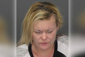 Michigan Woman Punches Police Officer, Tries to Grab Gun, Eats Pair of  Diamond Earrings During Messy Arrest