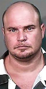 Man charged with murder in home invasion