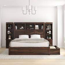 It offers side shelves for books and other small items. El Centro Solid Wood Storage Platform Bed Frame W Bookcase Headboard