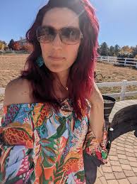 What is a birthday look for a T-shirt jeans and tennis shoes type of girl,  size XL shirts and 18 in bottoms?