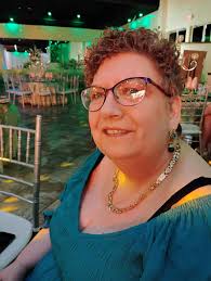 Hello, I'm in the middle of a group photo