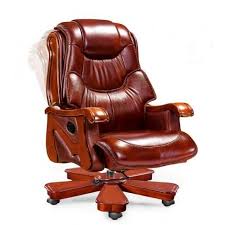 An interior of the home office with an executive chair and the big table. Buying Tips For Luxury Office Chairs Luxury Office Chairs Executive Office Chairs Luxury Desk