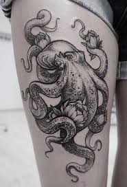 She also got a kitty face inked on her arm in grey. 37 Black And White Octopus Tattoos